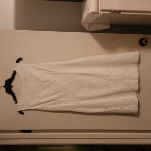 Beautiful Little white dress...laced and lined with a gold zipper in the back!